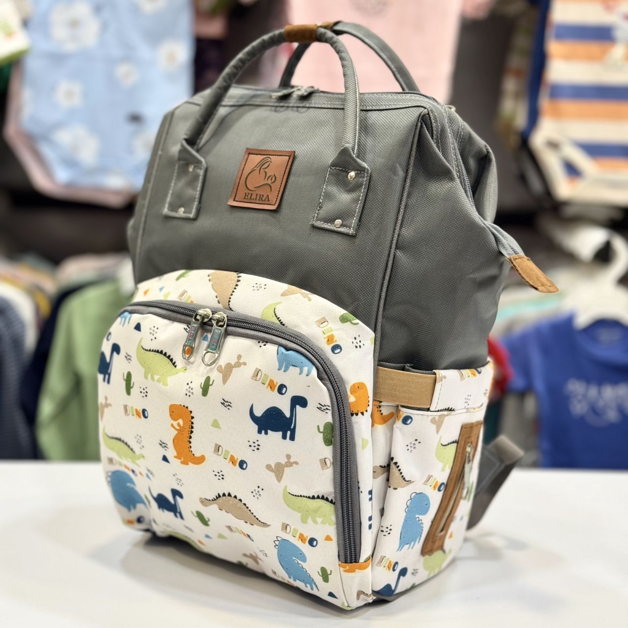 کیف(ساک) لوازم مادر الیرا elira مدل کوله ای طرح دایناسور