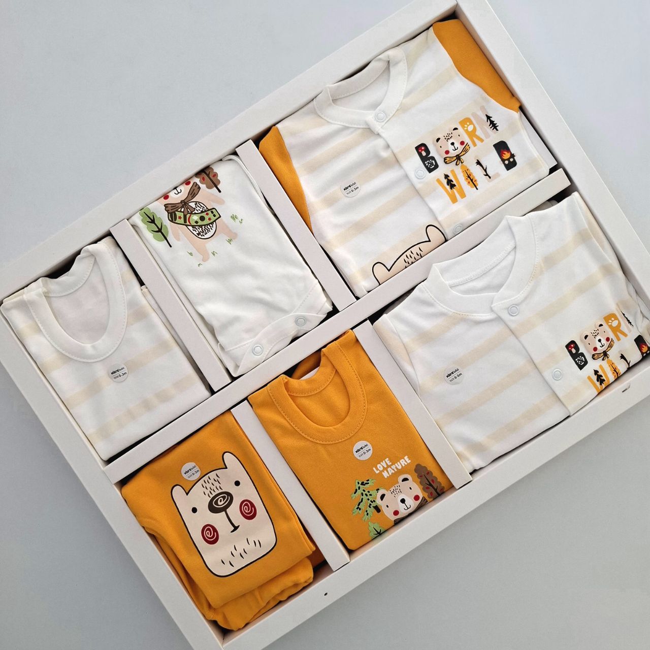 ست لباس ۱۹ تیکه نوزادی کیدزبو kidsboo سرهمی دار ۱۰۰٪ نخ پنبه طرح خرس نارنجی